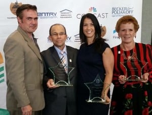 People standing with awards