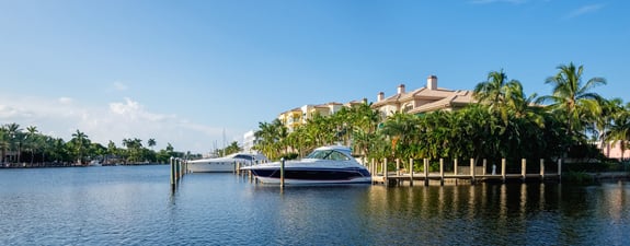 waterfront property with a boat docked